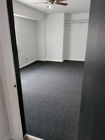 a view of room with a sink and a window