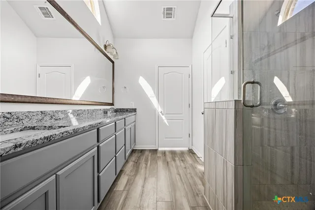 a view of a kitchen with a sink and dishwasher