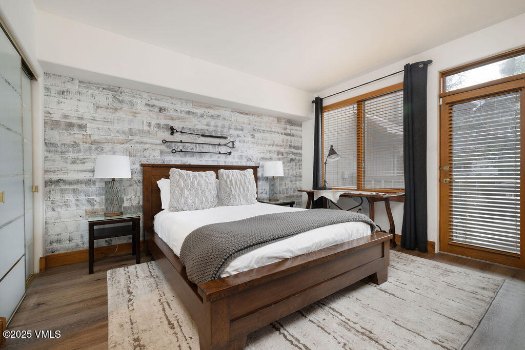 30 Cresta Road, Unit 308 Edwards, CO 81632 - Photo 5 of 9 a bed sitting in a bedroom next to a window