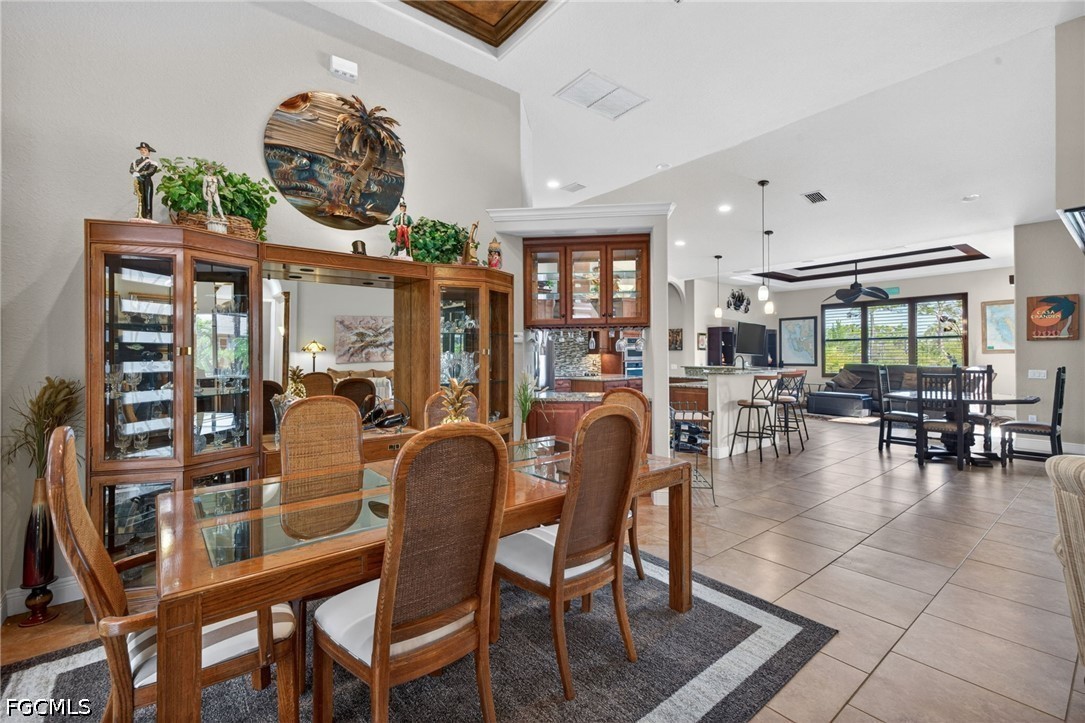6109 Calusa Rdg Trail Bokeelia, FL 33922 - Photo 15 of 48 a dining room filled with lots of furniture and lots of furniture