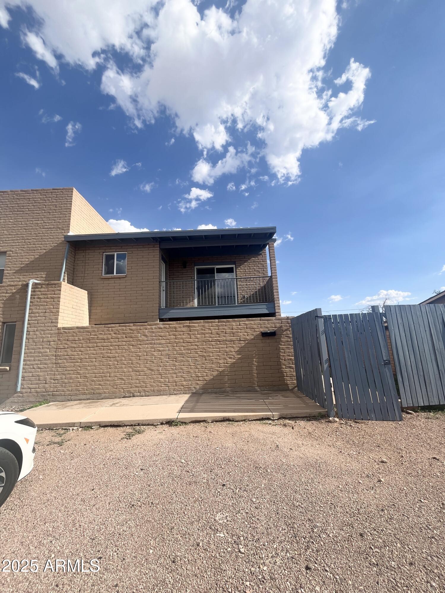 2075 11th Street Douglas, AZ 85607 - Photo 2 of 34 a view of a house with a backyard