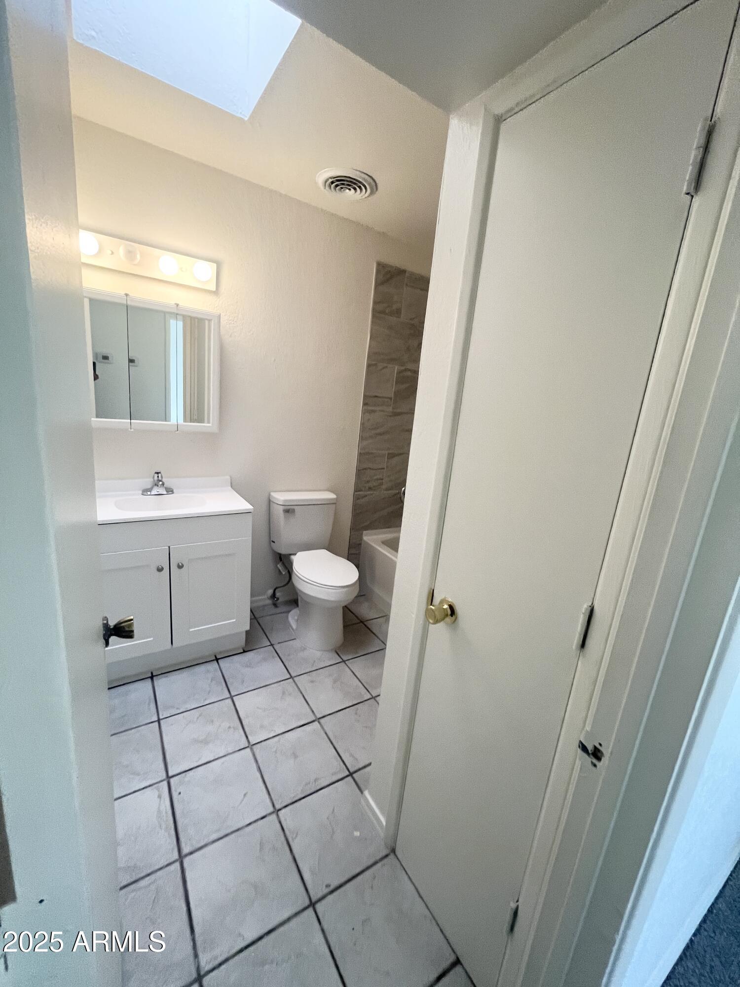 2075 11th Street Douglas, AZ 85607 - Photo 21 of 34 a bathroom with a sink and a mirror