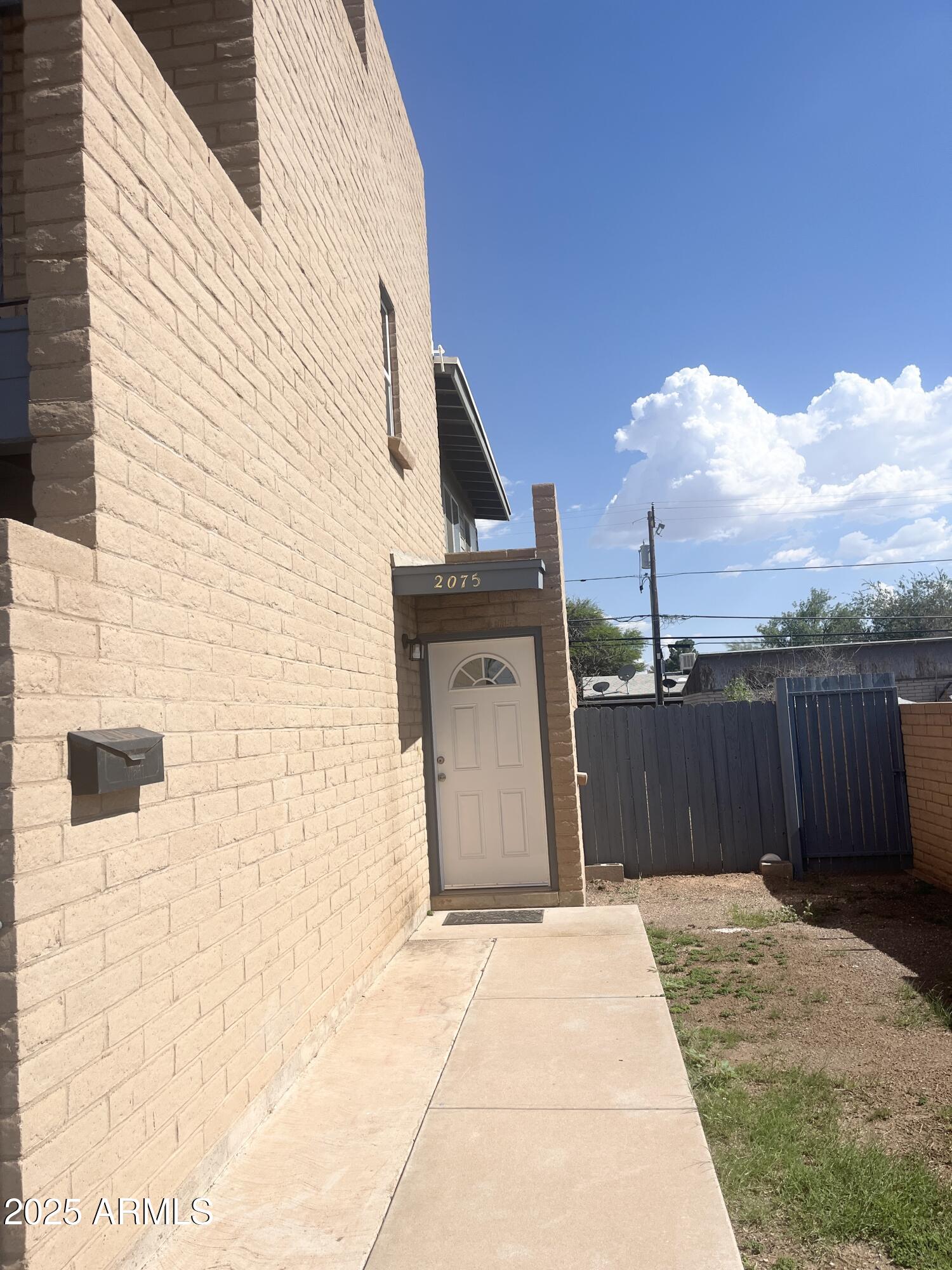 2075 11th Street Douglas, AZ 85607 - Photo 3 of 34 a view of a wooden fence