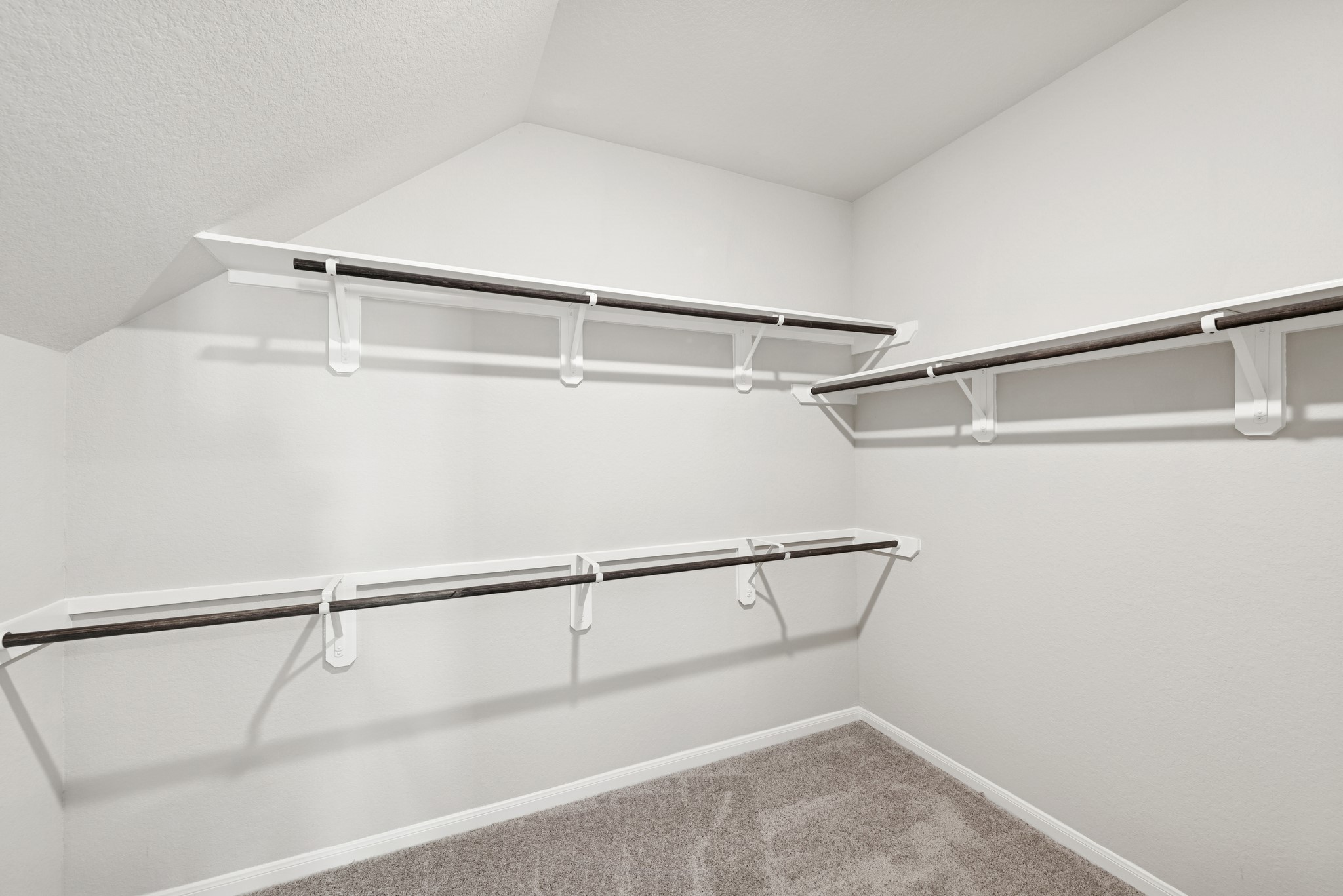 32303 Mimosa Ridge Lane Waller, TX 77484 - Photo 15 of 27 Owner's suite walk-in closet (*Photo not of actual home and used for illustration purposes only.)