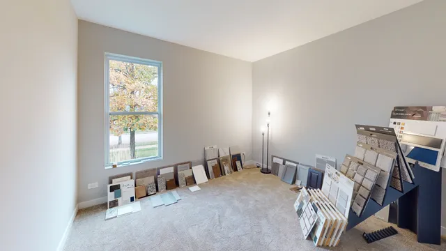 a view of a livingroom with furniture and windows