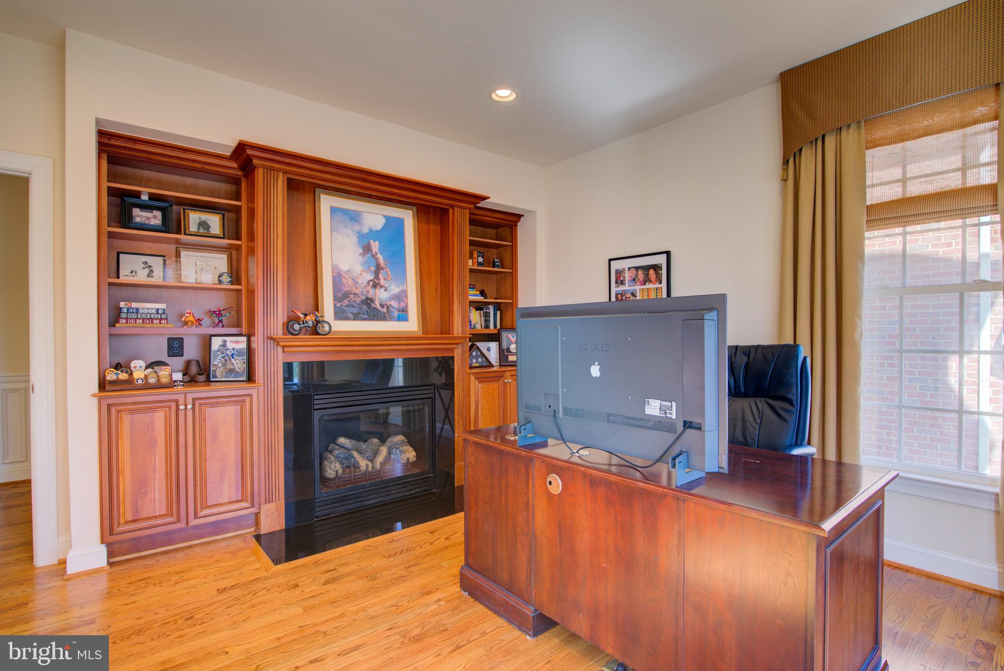 7690 Oak Field Court Springfield, VA 22153 - Photo 22 of 55 Main Level Office w/ Gas Fireplace & Built-Ins