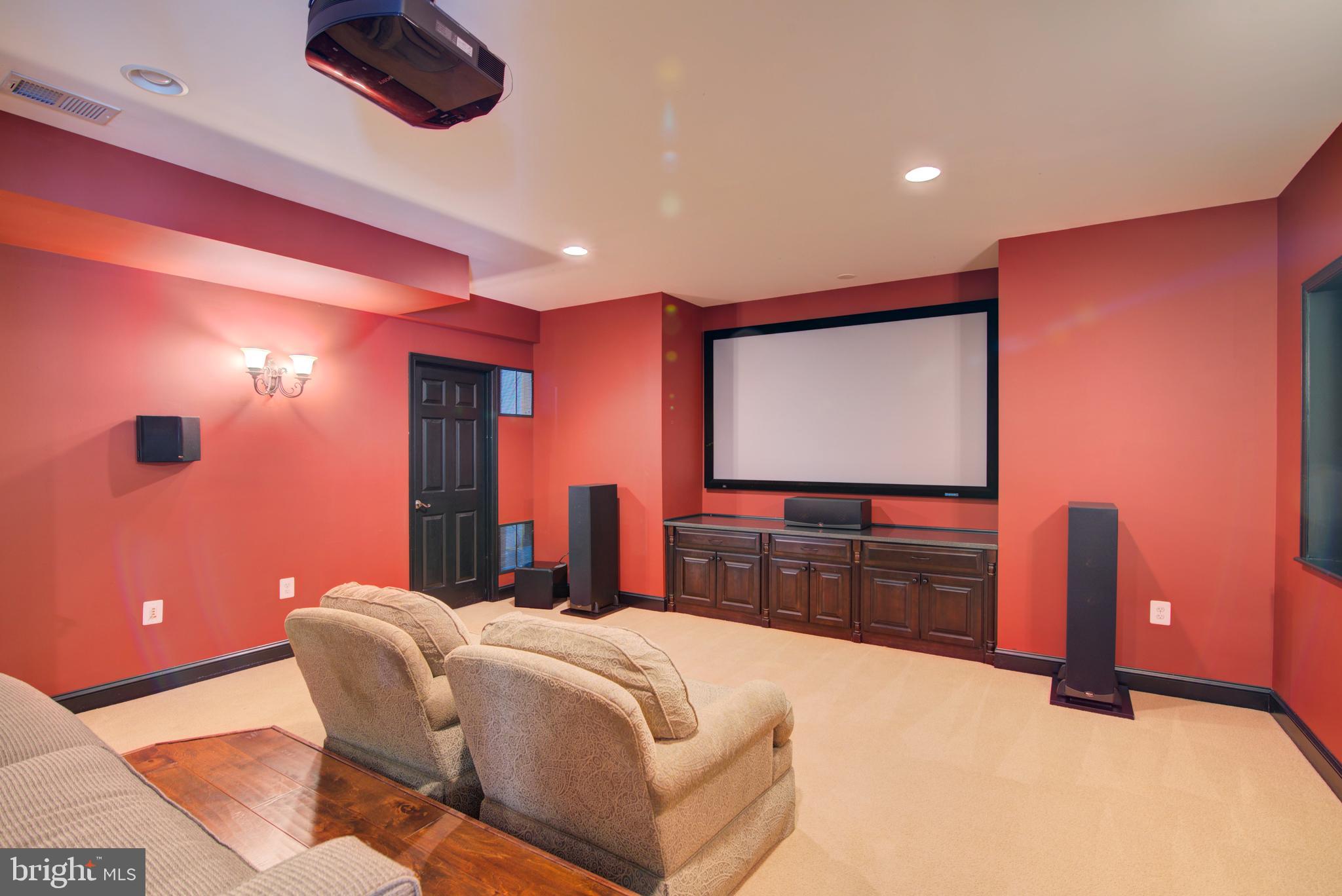 7690 Oak Field Court Springfield, VA 22153 - Photo 43 of 55 Theater Room w/ Stewart FireHawk Projector Screen