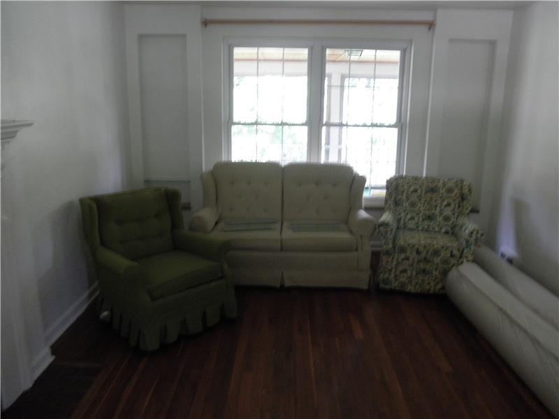 157 Orchard Spring Road Pittsburgh, PA 15220 - Photo 3 of 14 Living Room. BUILT-IN FLANKING SHELVING AREAS PRESENT MANY POSSIBILITIES.