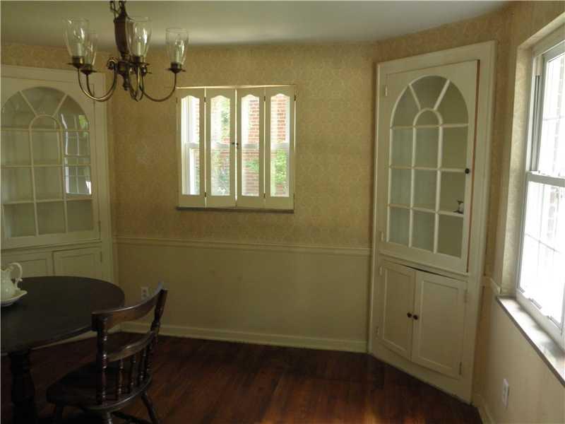 157 Orchard Spring Road Pittsburgh, PA 15220 - Photo 4 of 14 Dining Room. EXPOSED HARDWOOD FLOOR AND BUILT-IN CORNER CHINA CLOSETS BRING BACK THE OLD WORLD CHARM OF THE DINING ROOM