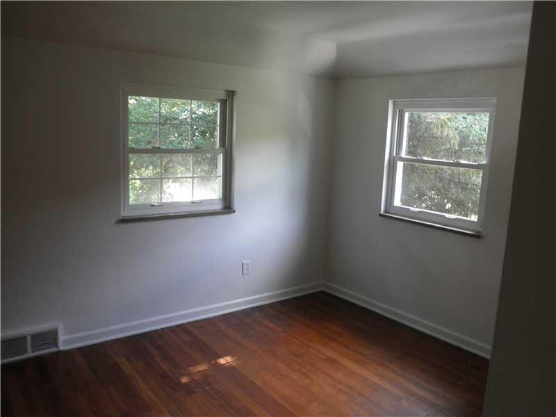 157 Orchard Spring Road Pittsburgh, PA 15220 - Photo 8 of 14 Bedroom. BEDROOM 2 ALSO HAS A NICE SIZE CLOSET AND EXPOSED FLOOR