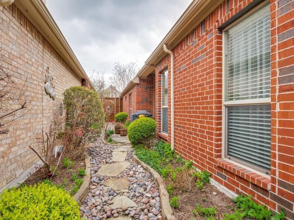 9962 Bell Rock Road Frisco, TX 75035 - Photo 27 of 28 a view of a pathway both side of house