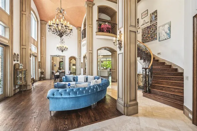 a bedroom with two beds and a window