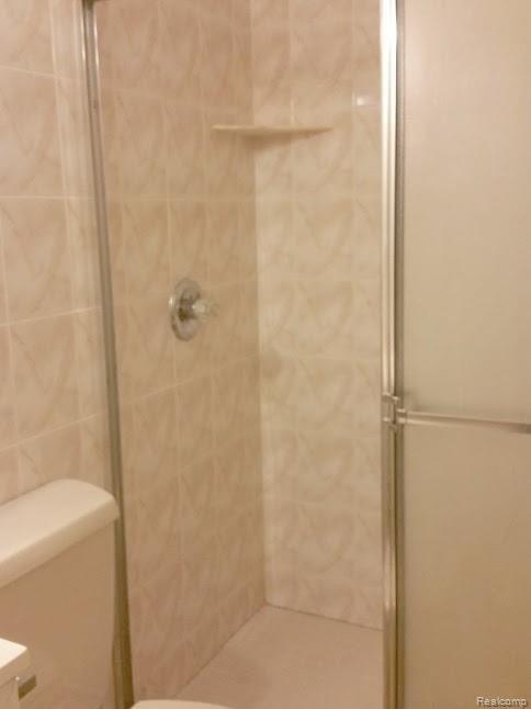 5379 Fenton Road Flint, MI 48507 - Photo 17 of 44 19 Shower in Main Floor Bathroom.jpg