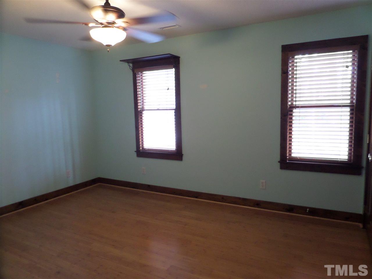 8725 Windjammer Drive Raleigh, NC 27615 - Photo 13 of 25 Large bedrooms abound. Bamboo floors- great for upkeep and anyone with allergies.