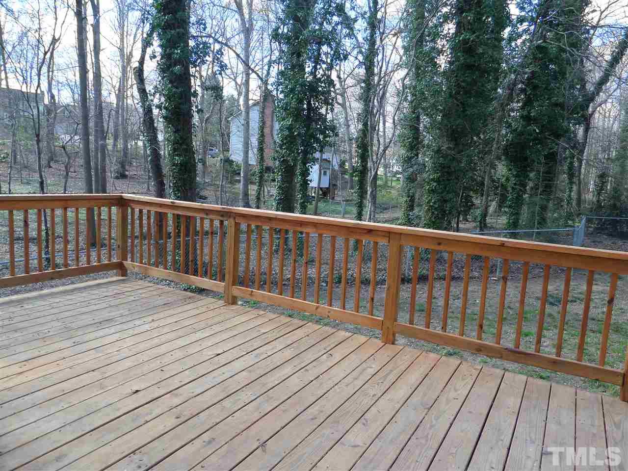 8725 Windjammer Drive Raleigh, NC 27615 - Photo 17 of 25 New Deck replaced old-Enjoy this gorgeous view 24/7! Enters from family room door.