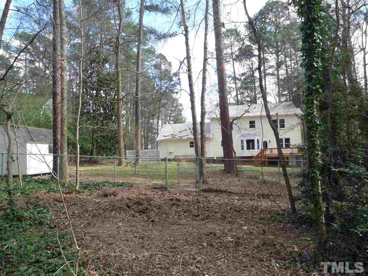 8725 Windjammer Drive Raleigh, NC 27615 - Photo 19 of 25 From bk lot looking at home and storage bldg