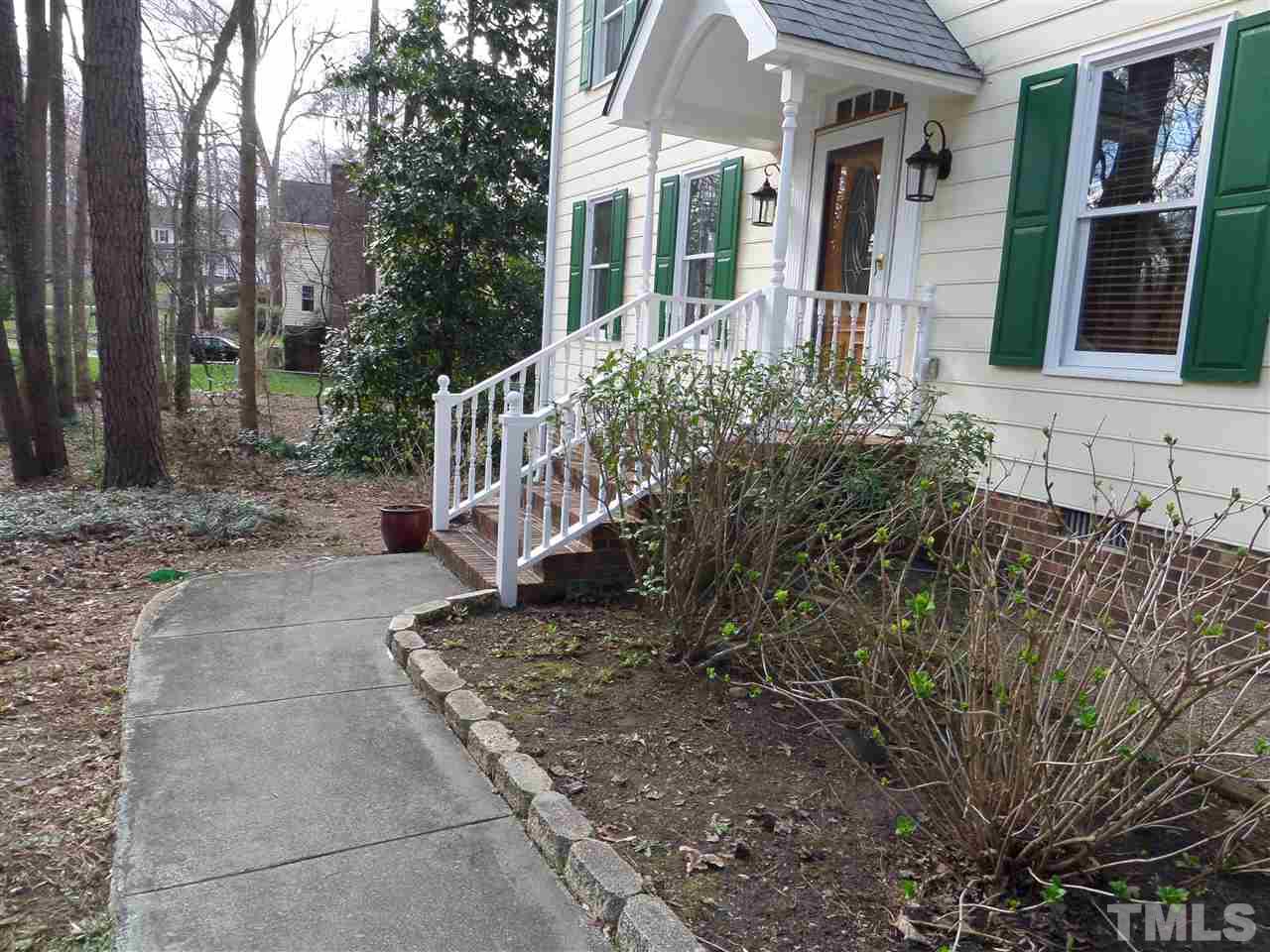 8725 Windjammer Drive Raleigh, NC 27615 - Photo 25 of 25 Sidewalk entrance-Welcome home! Beautiful hydrageas, daffodils, azaleas, iris, and fruit trees(Rabbit eye Blueberry bushes, Celeste Fig, dwarf Moonglow pear) & magnolia trees too are beginning to bloom.