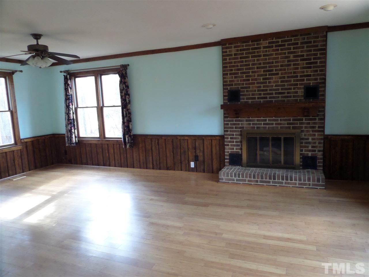 8725 Windjammer Drive Raleigh, NC 27615 - Photo 10 of 25 Enjoy the gas log fireplace for cozy eves