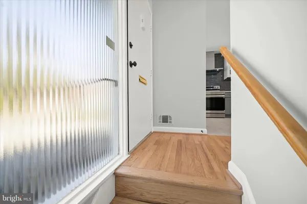 a view of a balcony with door