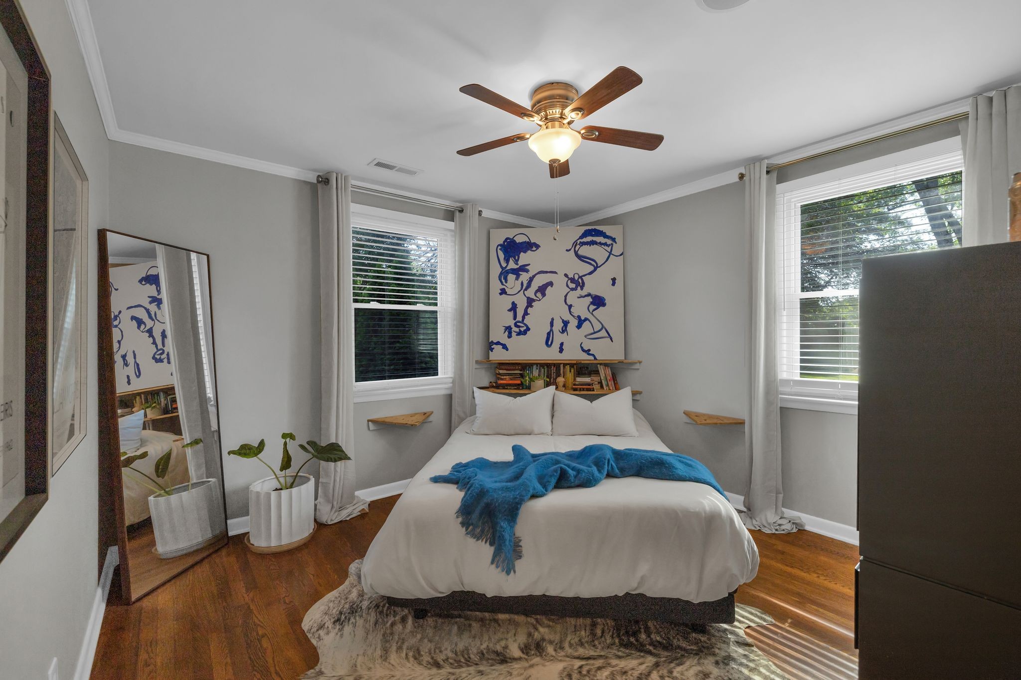 1610 Leaf Avenue Murfreesboro, TN 37130 - Photo 15 of 31 a bedroom with a bed and wooden floor