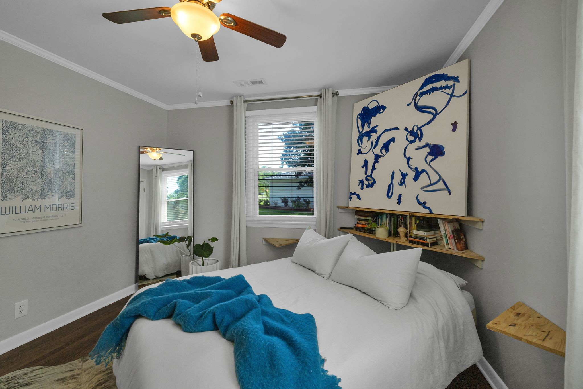 1610 Leaf Avenue Murfreesboro, TN 37130 - Photo 16 of 31 a bedroom with a bed and a painting on the wall