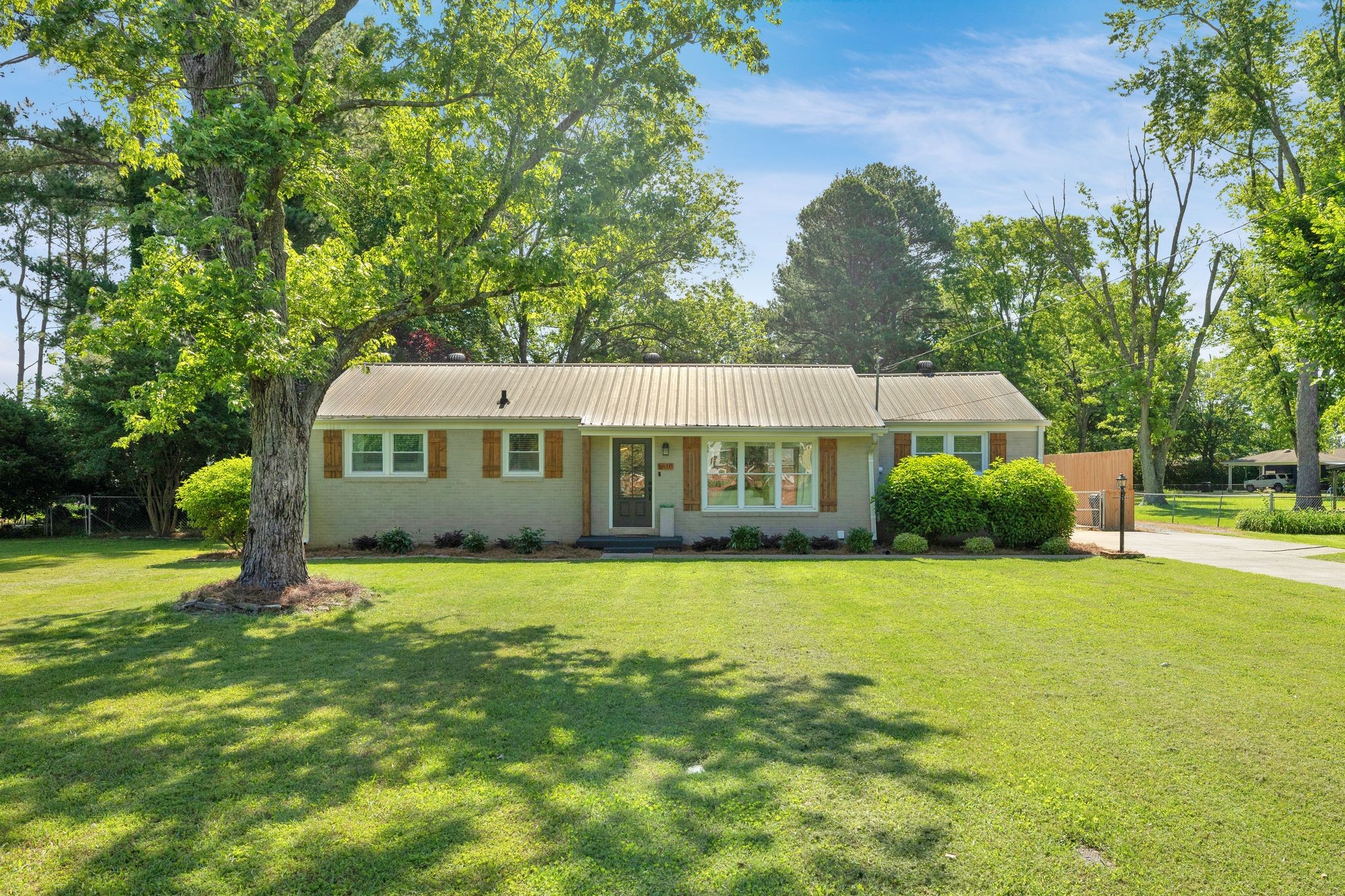 1610 Leaf Avenue Murfreesboro, TN 37130 - Photo 2 of 31 a front view of a house with garden