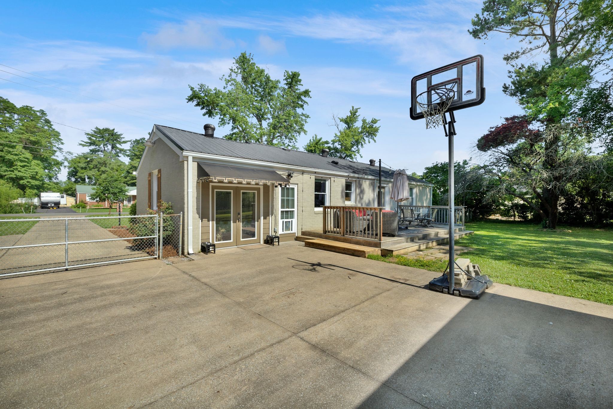 1610 Leaf Avenue Murfreesboro, TN 37130 - Photo 22 of 31 a view of a house with backyard sitting area and garden