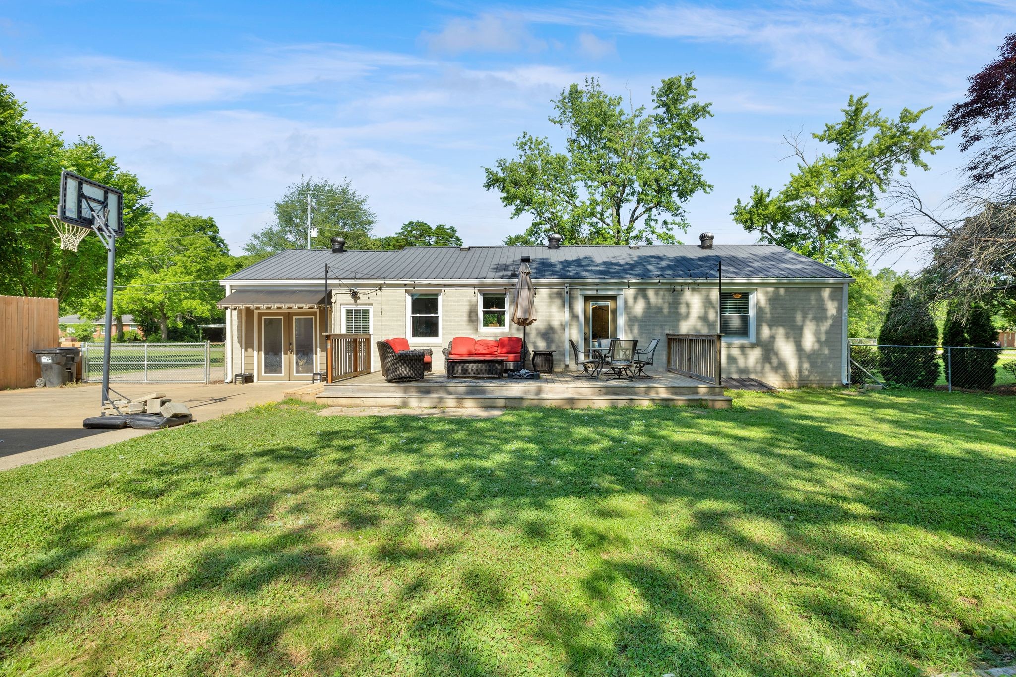 1610 Leaf Avenue Murfreesboro, TN 37130 - Photo 23 of 31 a view of house with backyard outdoor seating and green space