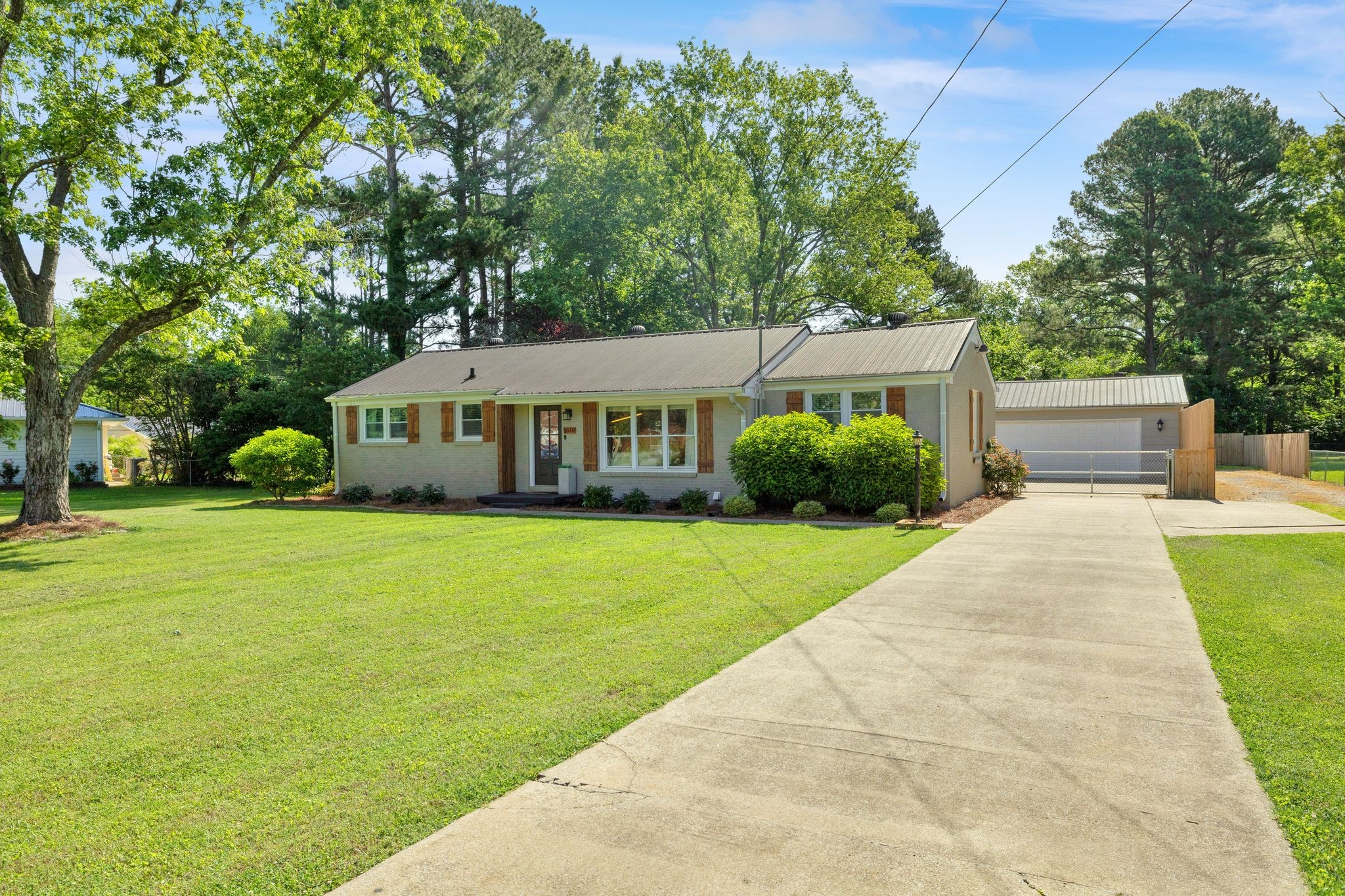 1610 Leaf Avenue Murfreesboro, TN 37130 - Photo 3 of 31 a front view of a house with garden