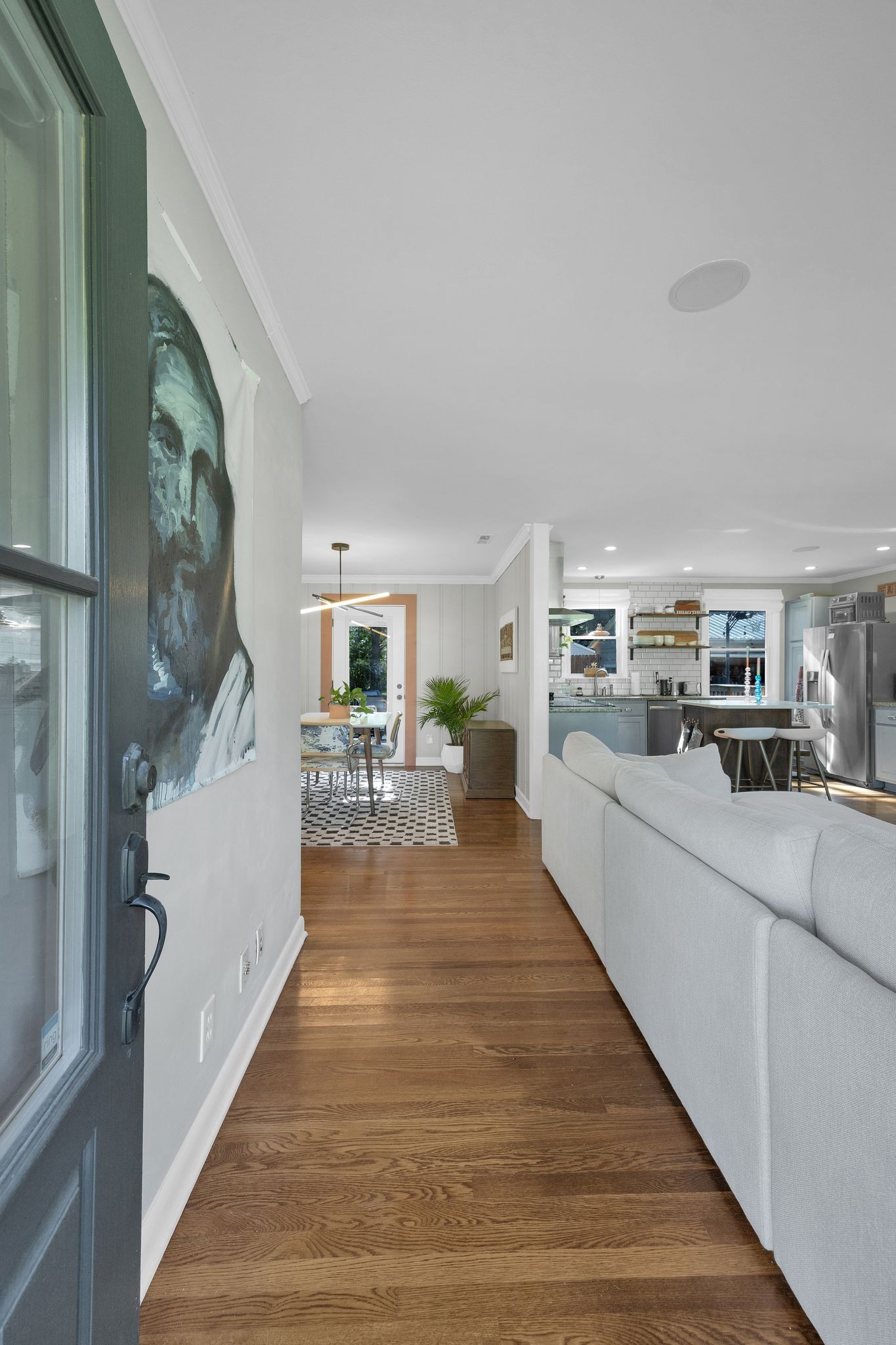 1610 Leaf Avenue Murfreesboro, TN 37130 - Photo 7 of 31 a view of a living room kitchen and a wooden floor