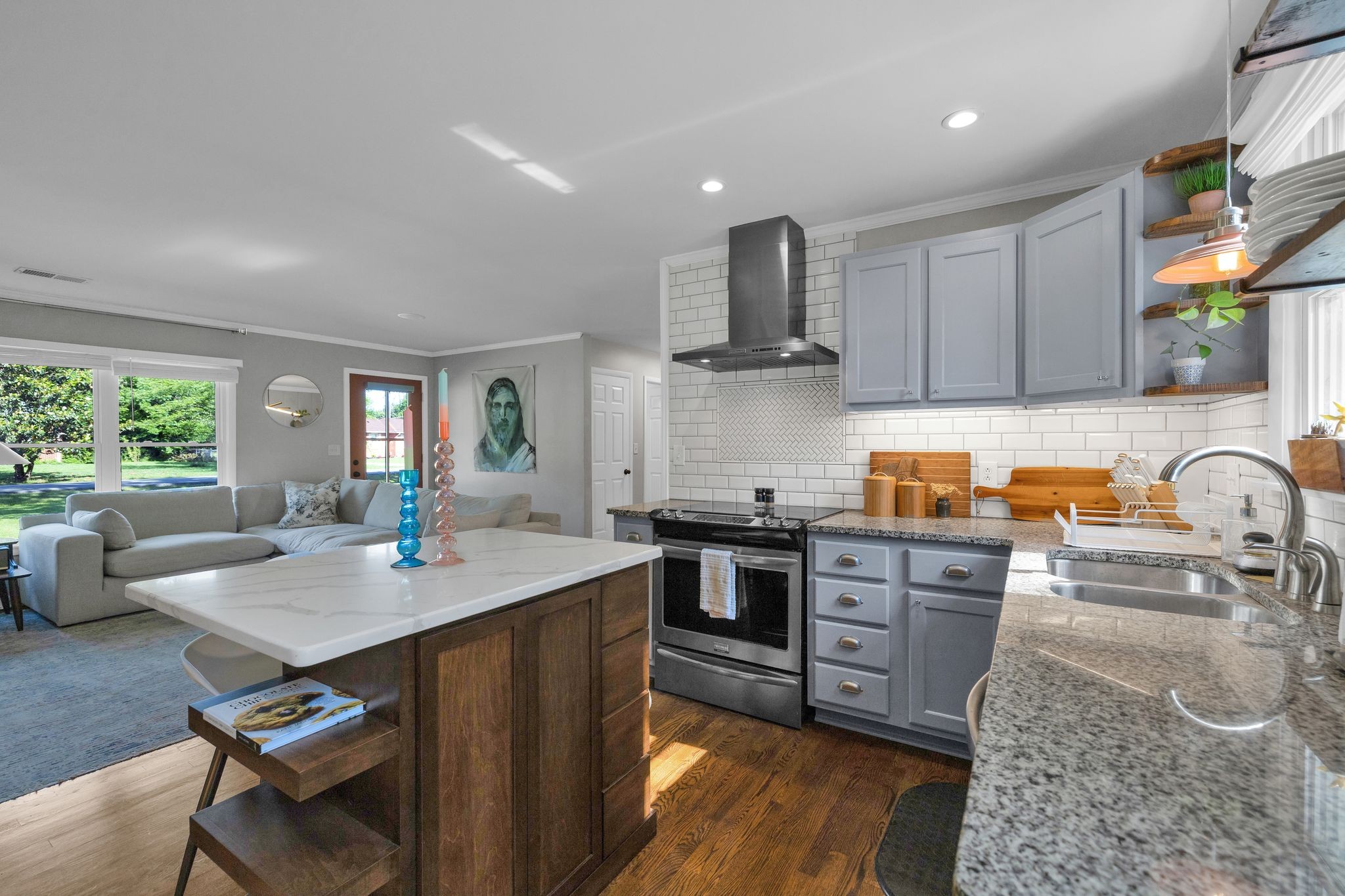 1610 Leaf Avenue Murfreesboro, TN 37130 - Photo 9 of 31 a kitchen with stainless steel appliances granite countertop a sink stove and refrigerator