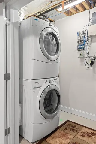 a front view of a residential apartment building with a yard