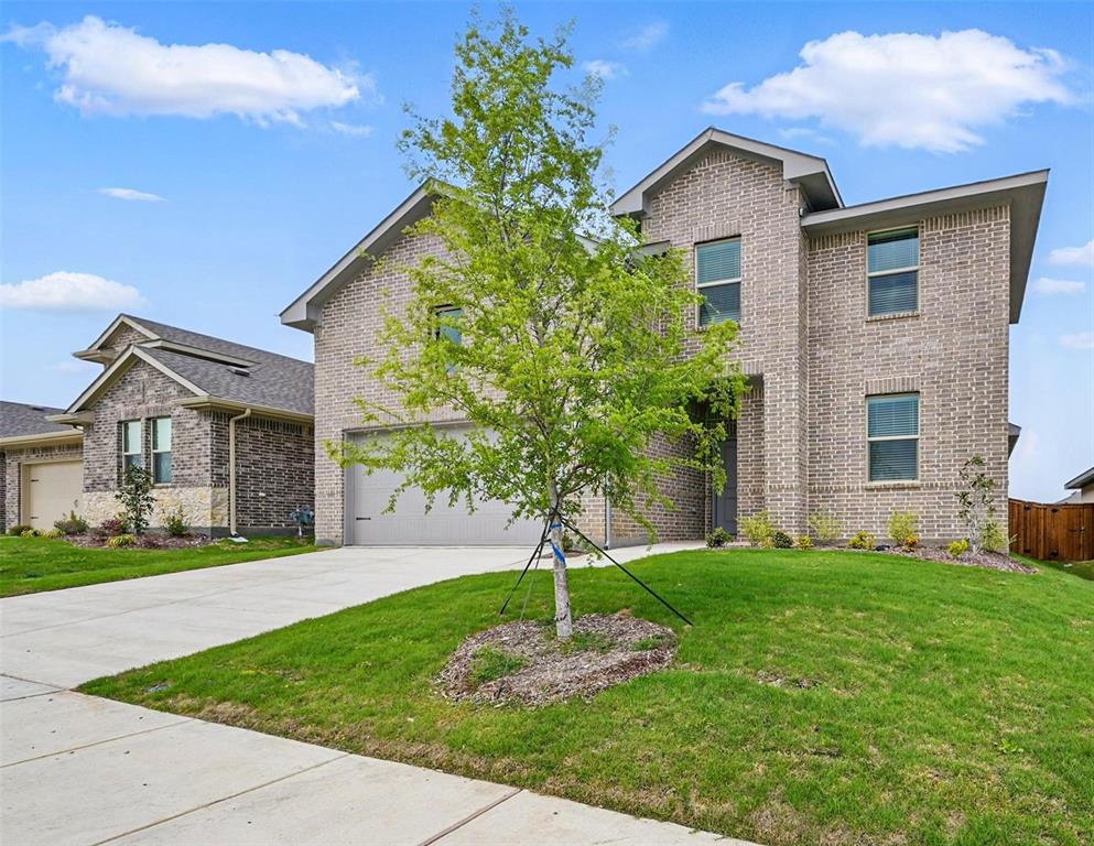 1413 Richardson Street Howe, TX 75459 - Photo 3 of 30 Two-story brick exterior with a grey asphalt shingle roof