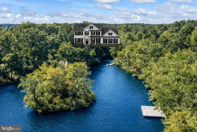a view of a lake with a building in the background