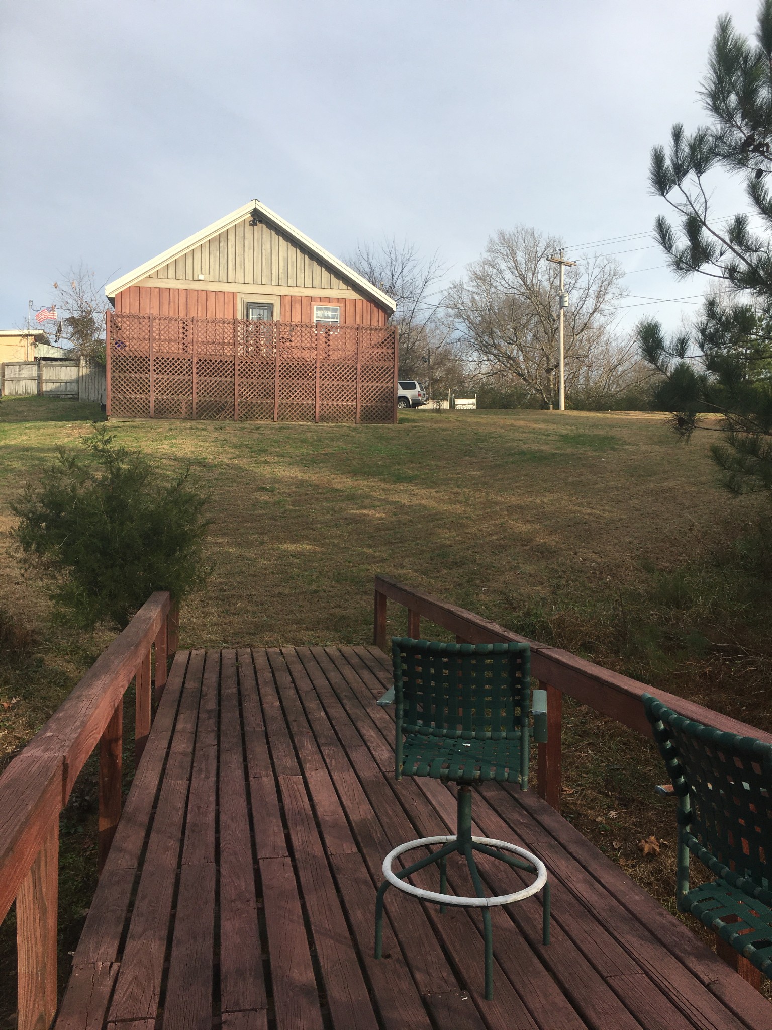 119 Cypress Road Buchanan, TN 38222 - Photo 4 of 26 a view of a roof deck with wooden floor and fence