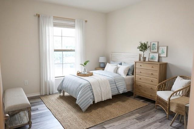 802 South 5th Street, Unit 1 Bonham, TX 75418 - Photo 14 of 25 Neutral-toned interior with light grey wood-finish flooring