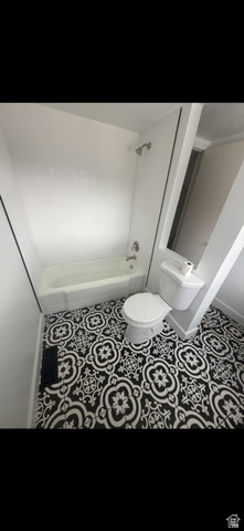 287 100 North Orem, UT 84057 - Photo 16 of 18 Full bath with shower / bathtub combination and tile patterned floors