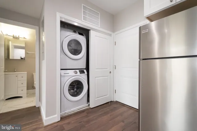 a utility room with dryer and washer