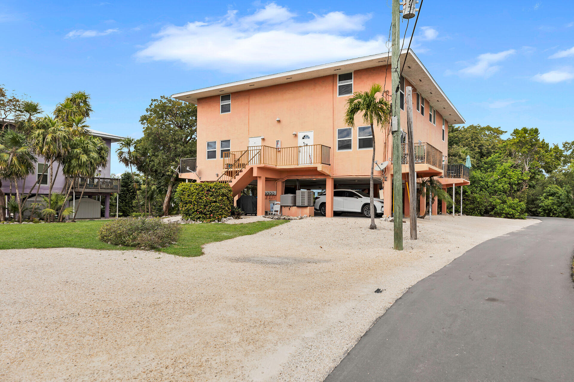 111 Stirrup Key Woods Road, Unit 2B1 Marathon, FL 33050 - Photo 31 of 36 a street view along with residential houses