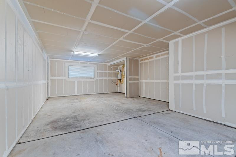 285 Mark Jeffrey Lane Reno, NV 89503 - Photo 15 of 16 an empty room with a empty shelves