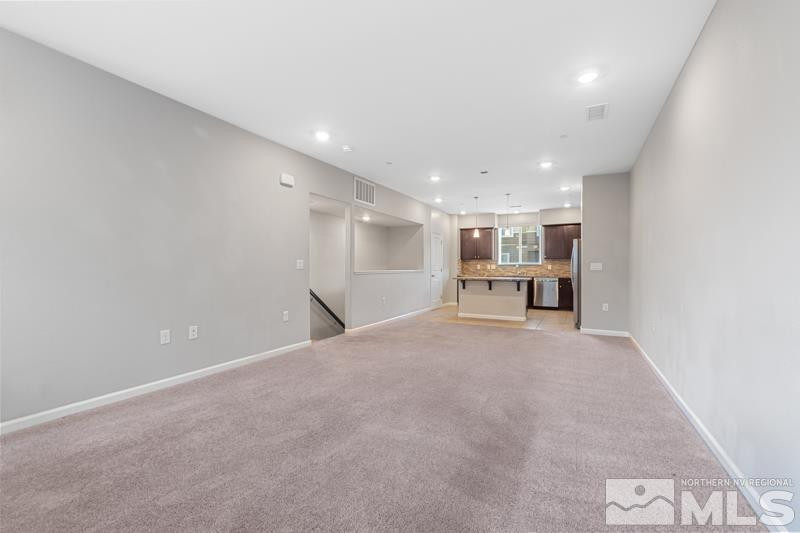 285 Mark Jeffrey Lane Reno, NV 89503 - Photo 4 of 16 a view of a big room with a kitchen