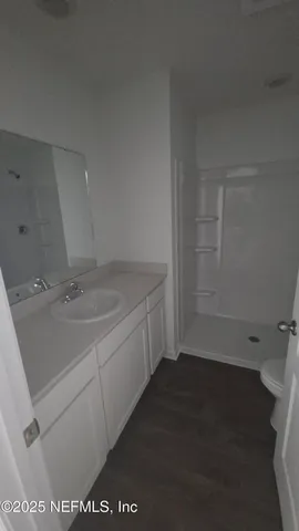 a bathroom with a sink and a toilet