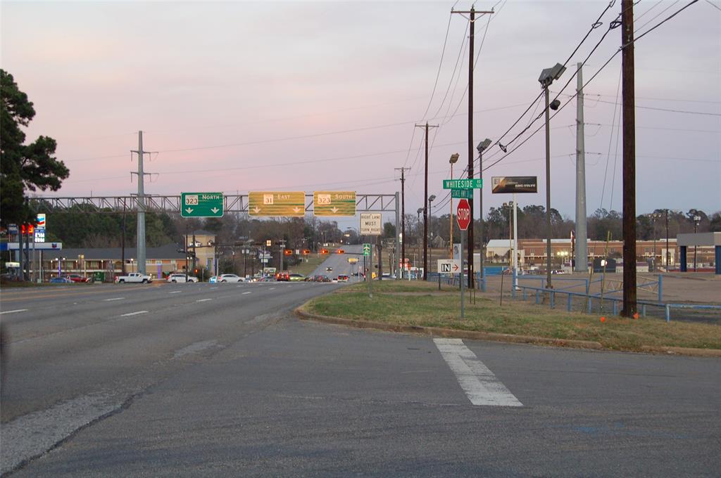 1004 Whiteside Road Tyler, TX 75709 - Photo 6 of 6 a view of a city with a building in the background