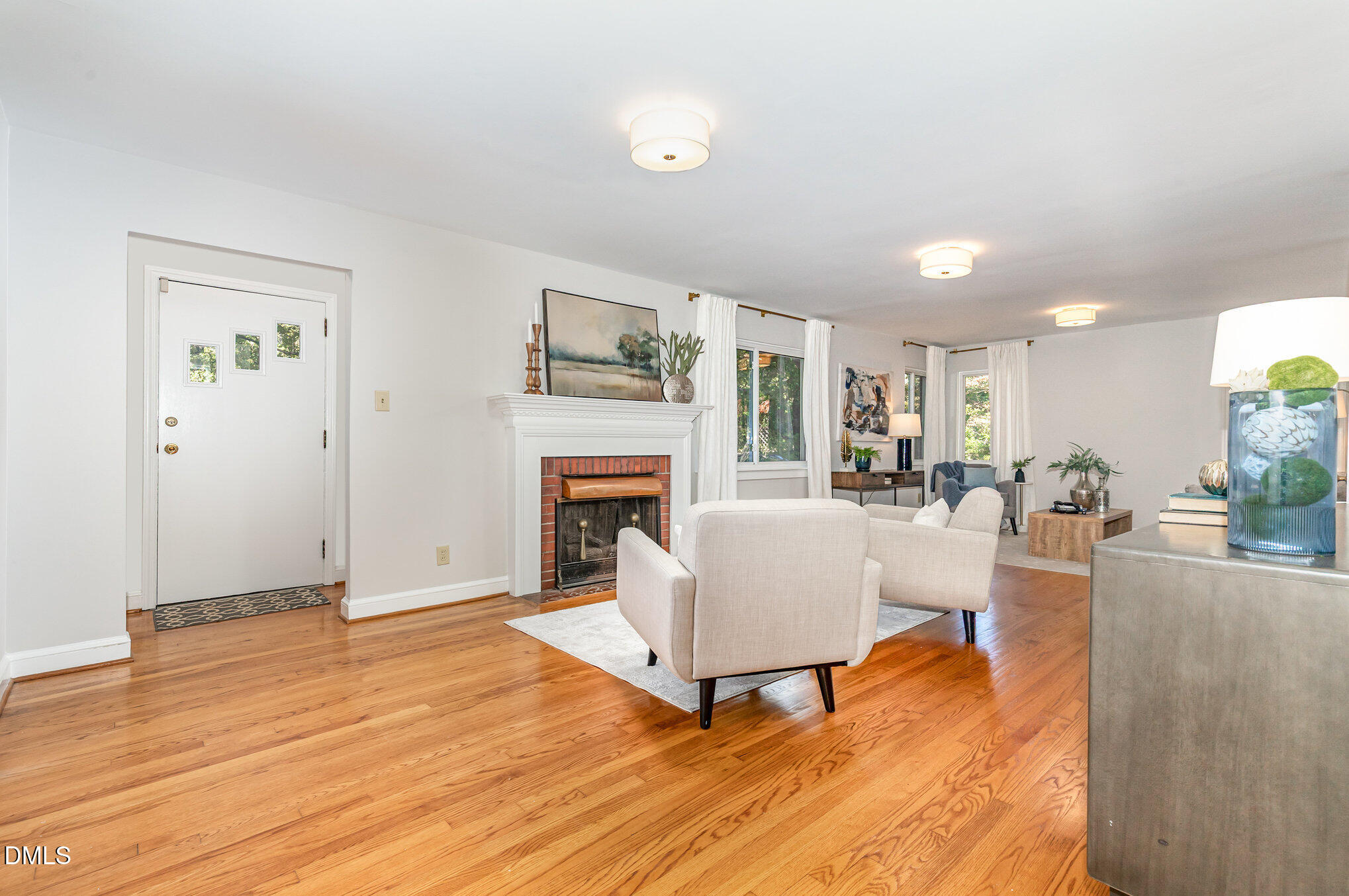 1316 Dixie Trail Raleigh, NC 27607 - Photo 2 of 36 a living room with furniture and a fireplace