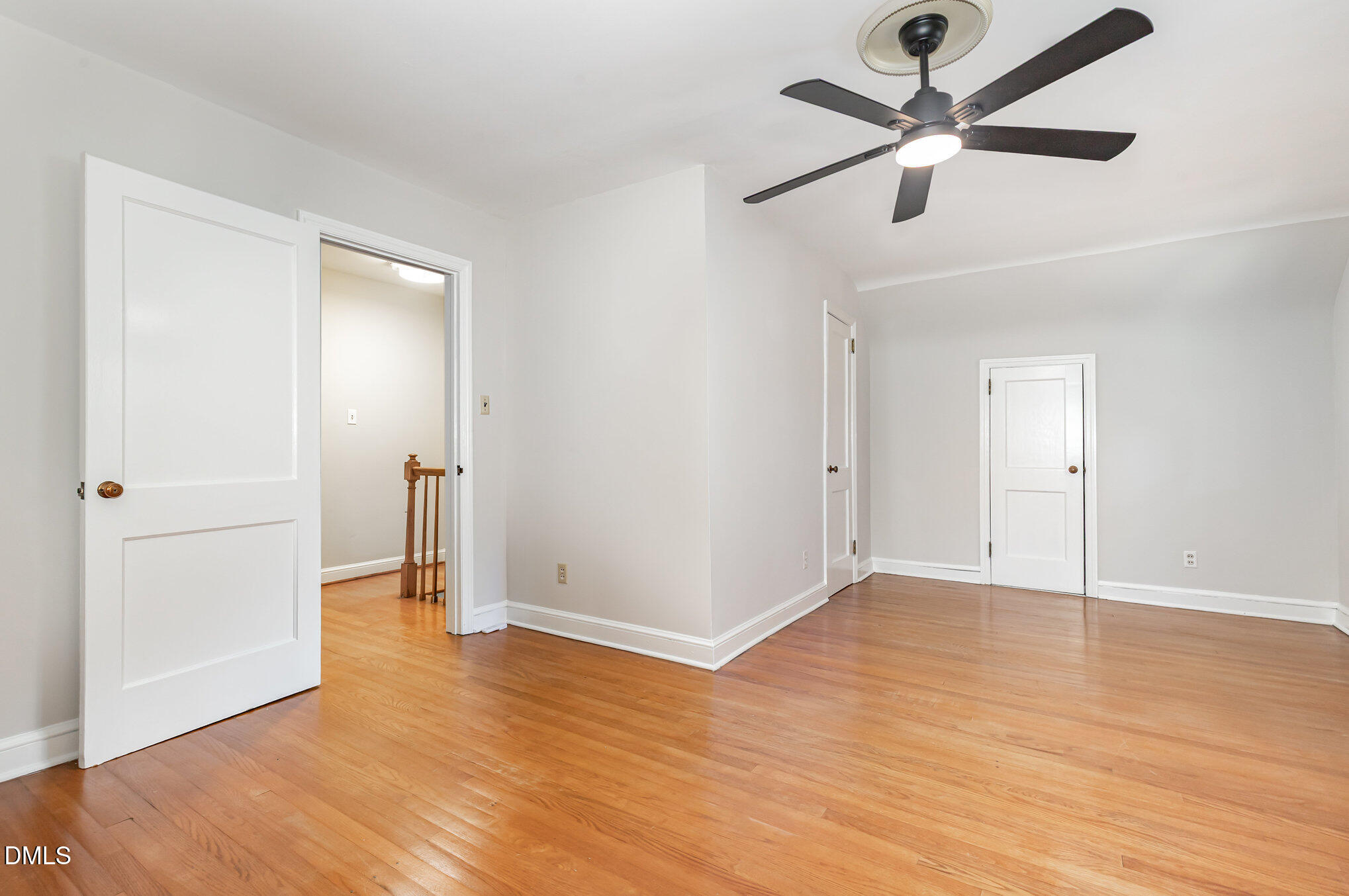 1316 Dixie Trail Raleigh, NC 27607 - Photo 21 of 36 a view of an empty room and wooden floor
