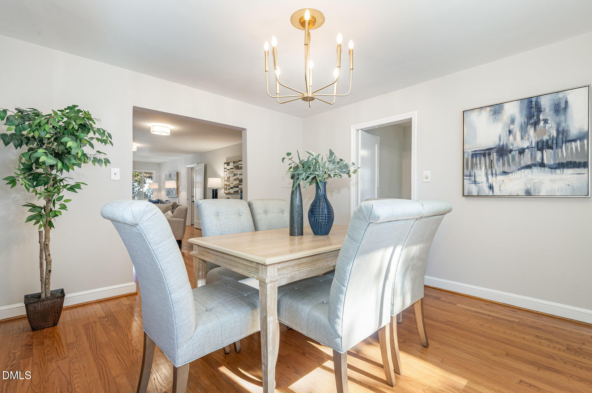 1316 Dixie Trail Raleigh, NC 27607 - Photo 7 of 36 a view of a dining room with furniture and wooden floor