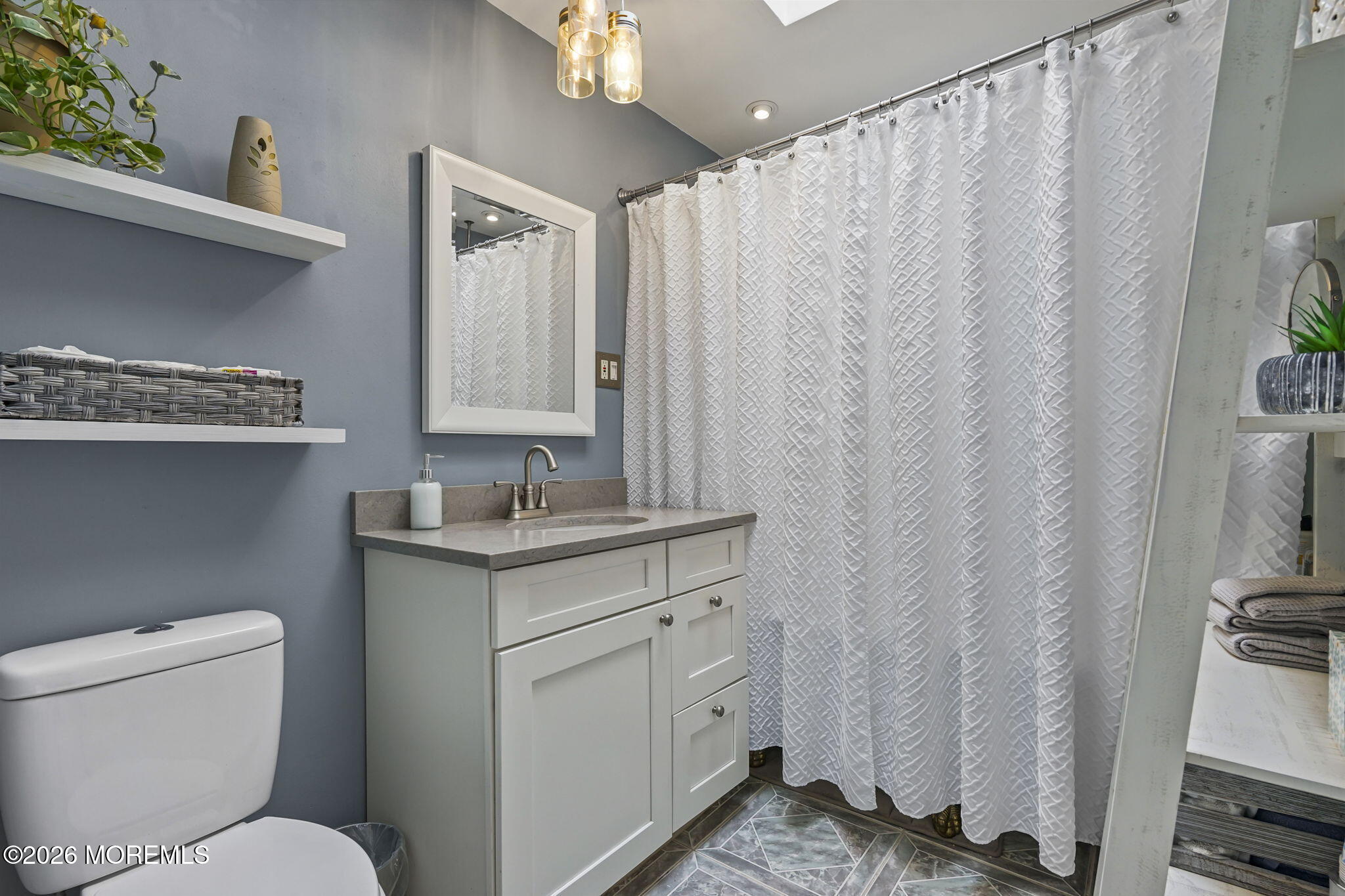 438 Bennetts Mills Road Jackson, NJ 08527 - Photo 23 of 42 a bathroom with a granite countertop sink toilet and a mirror