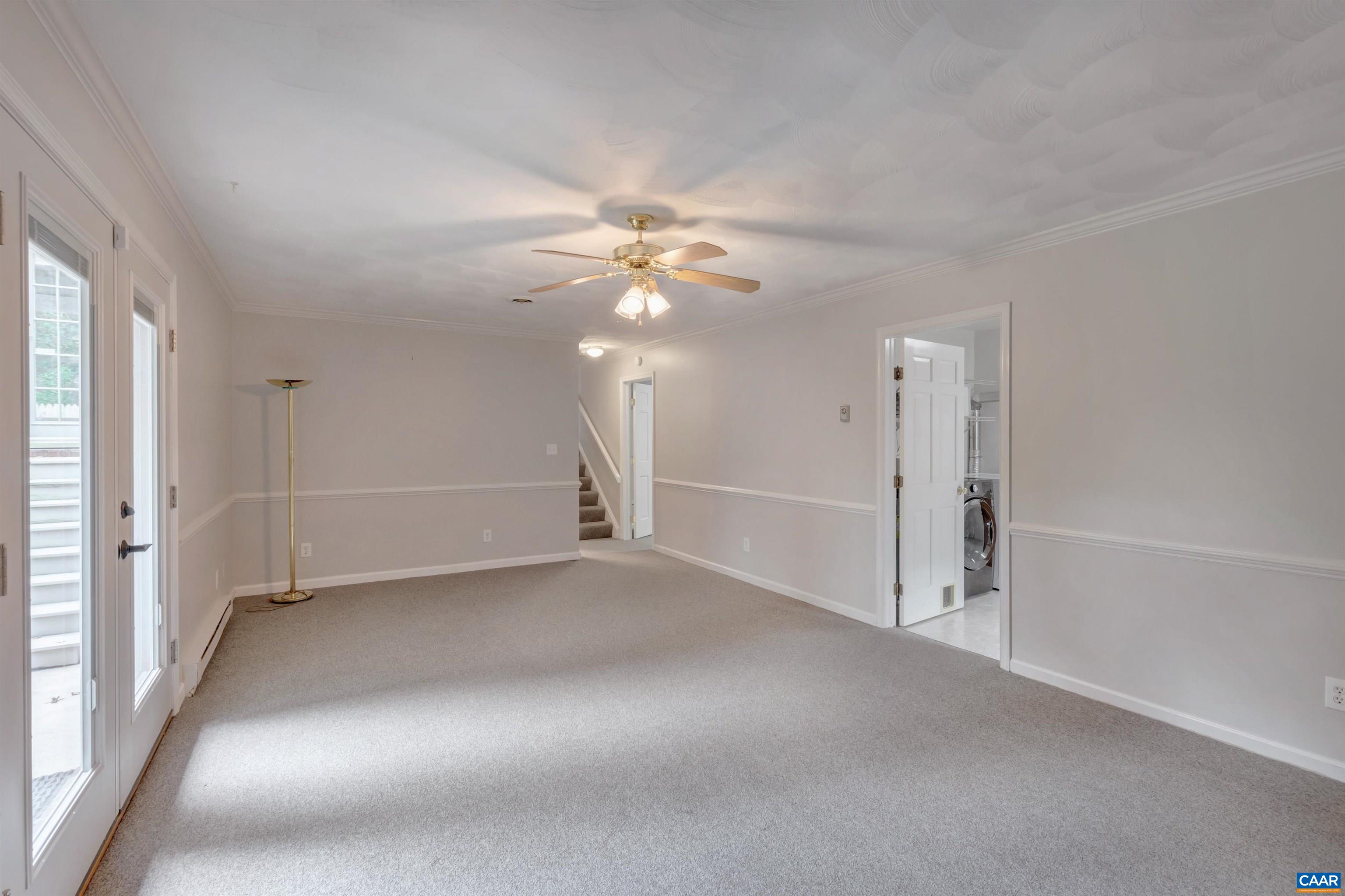 208 Westminster Road Charlottesville, VA 22901 - Photo 31 of 38 an empty room with a ceiling fan and a window