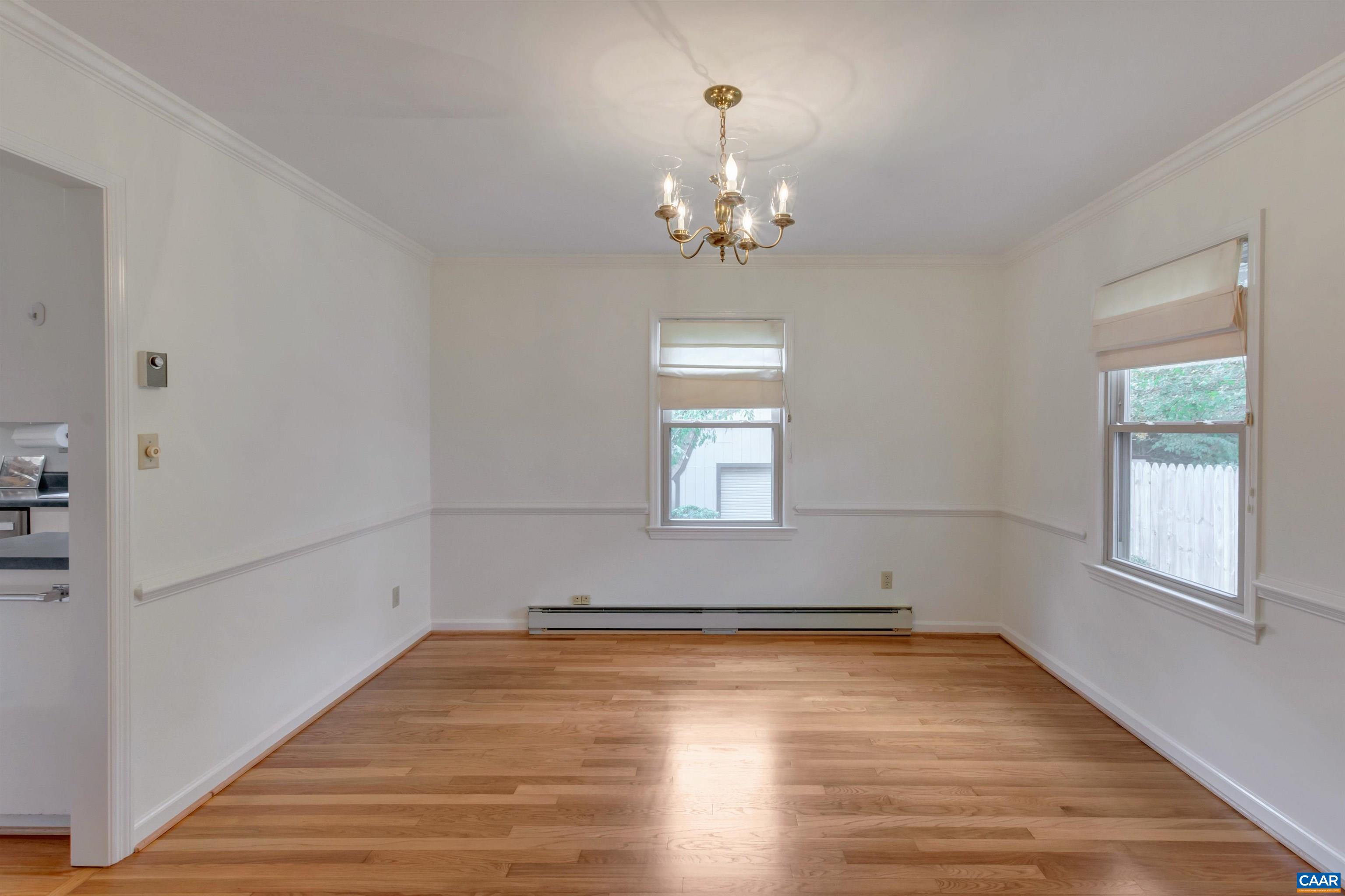 208 Westminster Road Charlottesville, VA 22901 - Photo 8 of 38 wooden floor in an empty room with a window