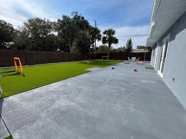 a view of outdoor space with trampoline